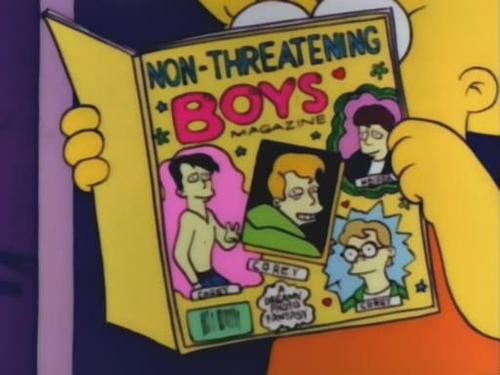 Lisa Simpson holds a copy of Non-Threatening Boys Magazine